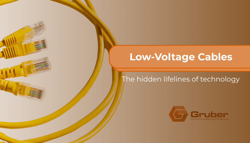 Yellow Ethernet cables coiled together with text overlay: Low-Voltage Cables – The hidden lifelines of technology. Gruber Communications Products logo in the corner.