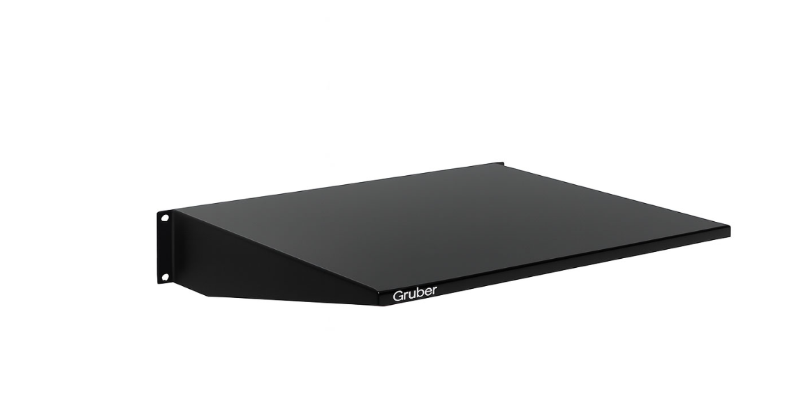 A high-angle product shot of a black powder-coated metal cantilever shelf (designed for front-mount support in equipment racks), with the brand name 'Gruber' printed in white on the lower right front.