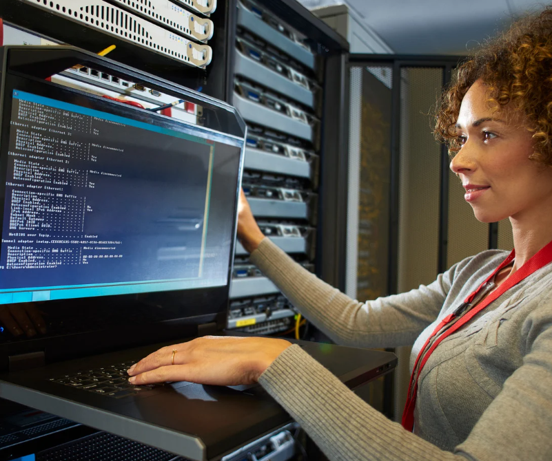 A GIRL WITH A LAPTOP ON CANTILEVER SHELF
